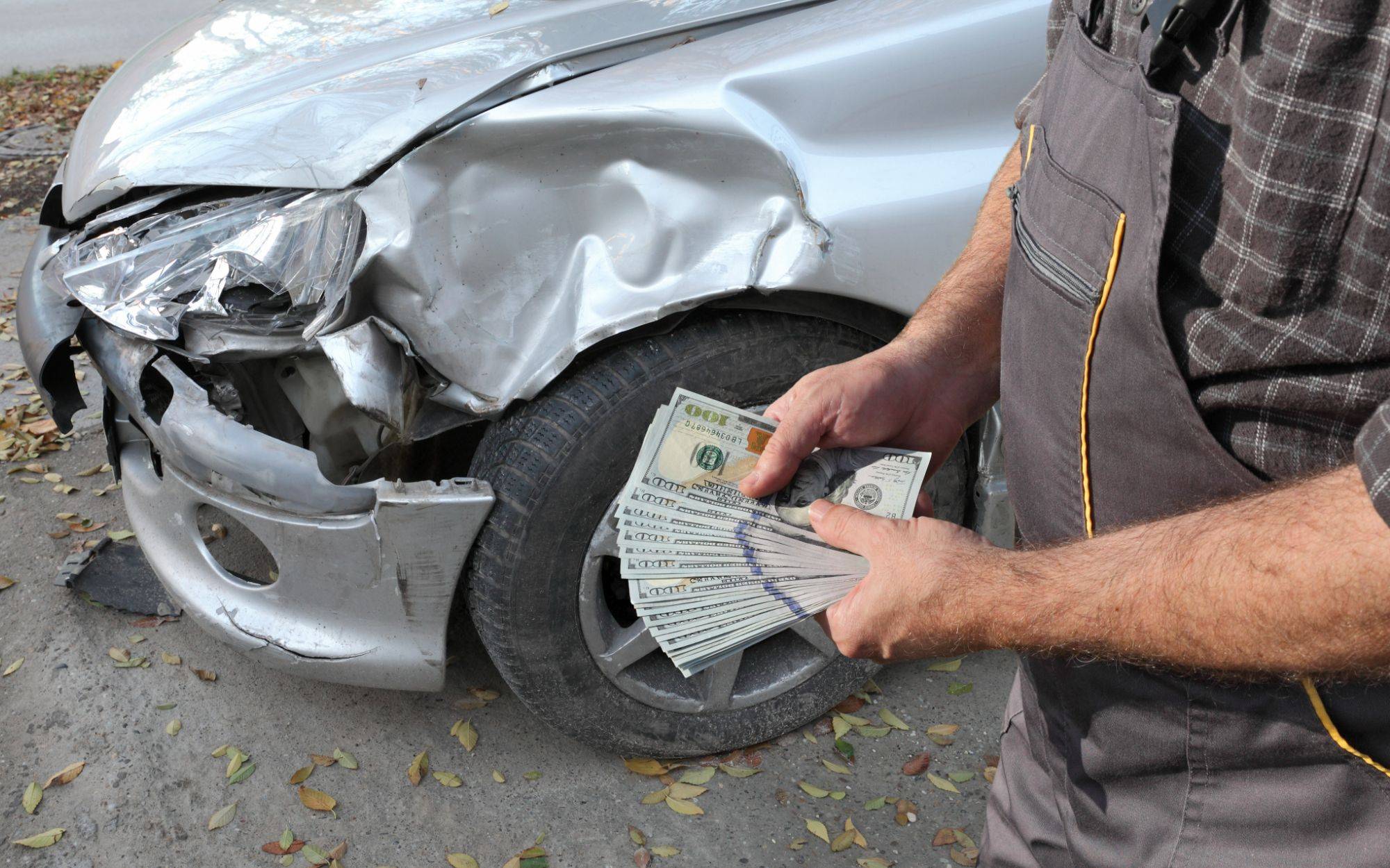 Damaged Car Inspection, Male Hands Holding Money